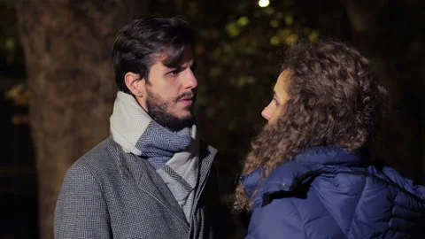 Painful goodbye - young man does not accept the end of love with his girlfriend Stock Footage 147306597