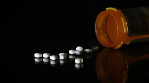 Painkillers Spilled From Pill Bottle 4 Stock Footage 8922983