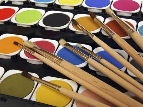 Paint and brushes Stock Photos