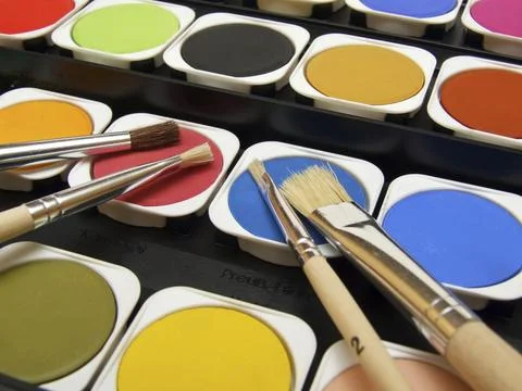 Paint and brushes Stock Photos