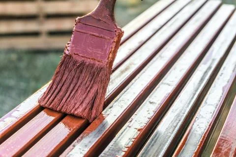 Paint application by brush on metal structures Stock Photos