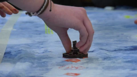 Paint being applied to material using a stamp Stock Footage 239655113