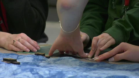 Paint being applied to material using a stamp Stock Footage 239655549