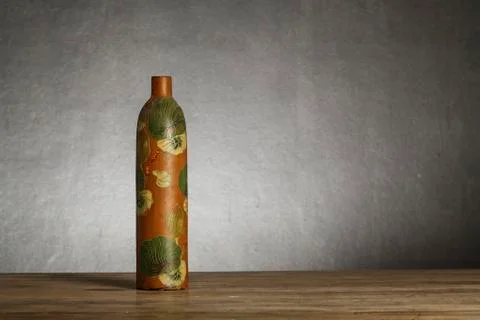Paint bottle on gray background Stock Photos