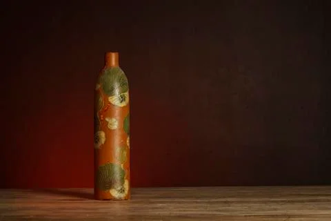 Paint bottle on red background Stock Photos