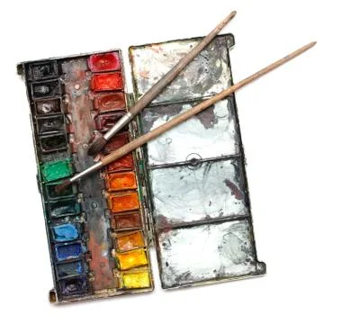 Paint box with messy brushes Stock Photos