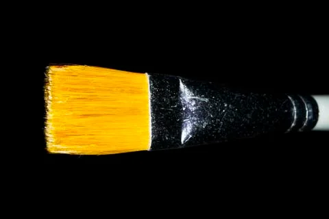 Paint brush on black background. Macro image Stock Photos