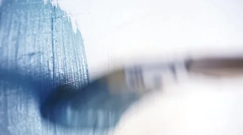 Paint brush in blue wall Stock-Footage 62022830