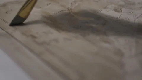 Paint brush draw ancient map with transparent light brown watercolor, close-up Video stock 94761918
