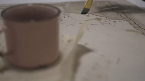 Paint brush draw ancient map with transparent light brown watercolor, close-up Stock-Footage 94765389