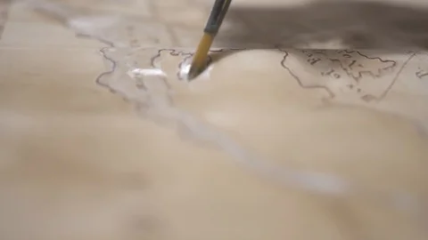 Paint brush draw ancient map with light beige watercolor, close-up Vídeo Stock 94768302
