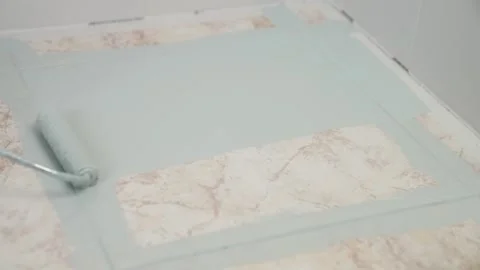 Paint brush floor ceramic. Paint Roller.light blue Stock Footage 166926231