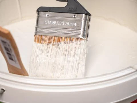 Paint brush in the paint can Stock Photos