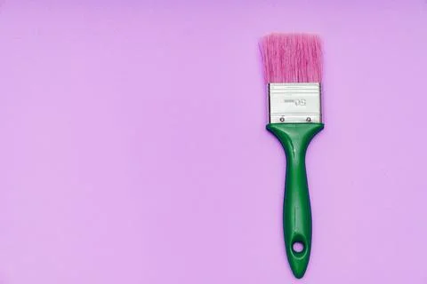 Paint brush on a pink background Stock Photos