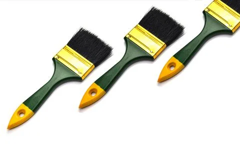 Paint brush placed on a white background Stock Photos
