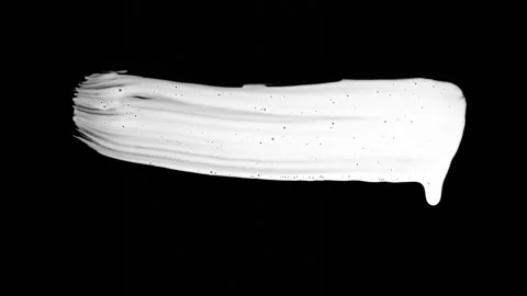 Paint Brush Stroke White Leaking and Dripping isolated on Black Background Stock Footage 222119322