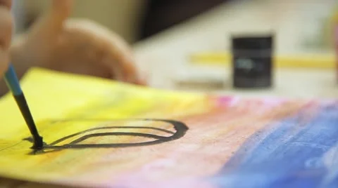 Paint brush with watercolor on paper Stock Footage 59605686