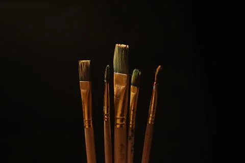 Paint brushes on a black background. 写真素材