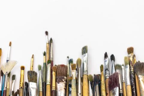 Paint brushes of different sizes on a white background isolated. Stock Photos