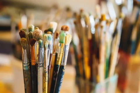 Paint Brushes isolated in blur background, close-up Stock Photos