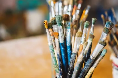 Paint Brushes isolated in blur background, close-up Stock Photos