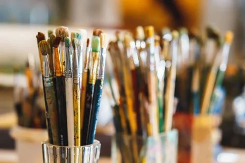 Paint Brushes isolated in blur background, close-up Stock Photos
