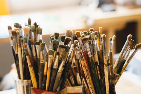 Paint Brushes isolated in blur background, close-up Stock Photos