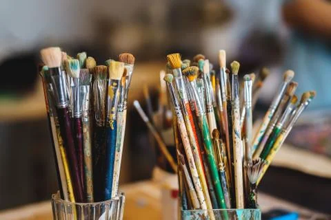 Paint Brushes isolated in blur background, close-up Stock Photos