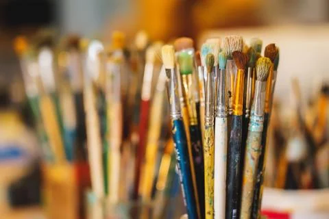 Paint Brushes isolated in blur background, close-up Stock Photos