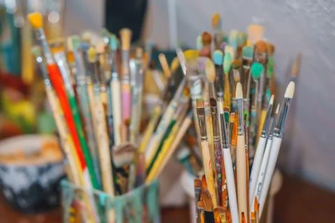 Paint Brushes isolated in grey background, close-up Stock Photos