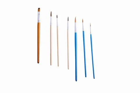 Paint brushes isolated on white background. Flat lay. Stock Photos