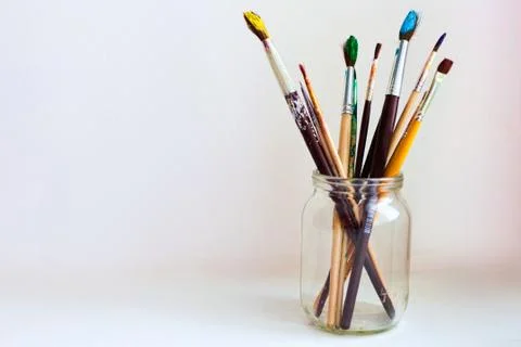 Paint brushes in jar Stock Photos