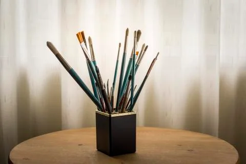 Paint brushes in jar Stock-Fotos