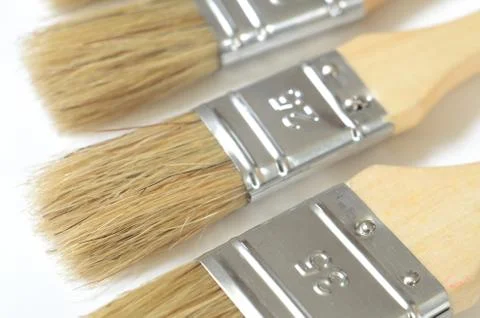 Paint brushes on a white background Stock Photos