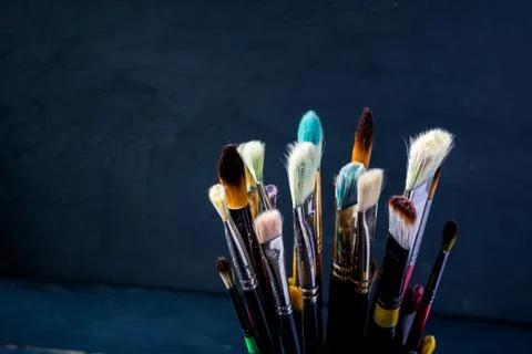 Paint btushes background Stock Photos