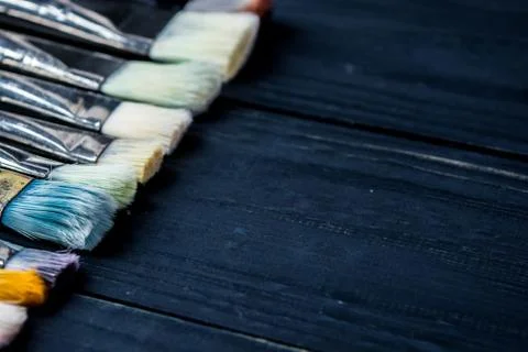 Paint btushes background Stock Photos