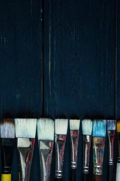 Paint btushes background Stock Photos