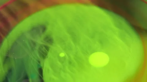 Paint bubbles neon mist ink water mix green blob Stock Footage 274691316