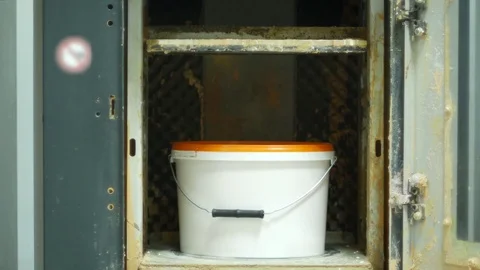 A paint bucket shaking in the machine for toning the interior/exterier paints. Video stock 83761772