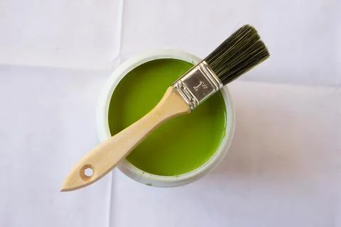 Paint can with brush on top Stock Photos