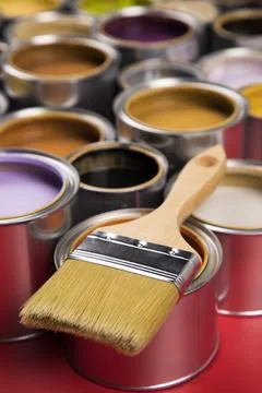 Paint can with a paintbrush Stock Photos