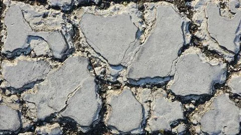 Paint on cracking asphalt patterns, lines, Stock Photos