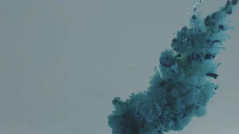 Paint dissolves in water slow mo Stock Footage 171664248