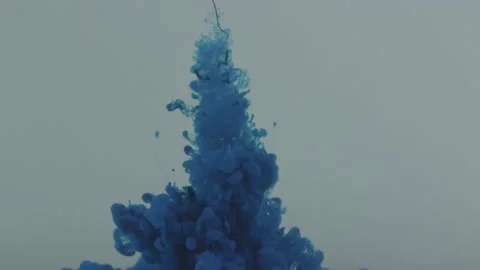 Paint dissolves in water slow mo Stock Footage 171664587