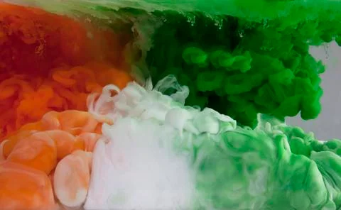 Paint dissolving in water Stock Photos