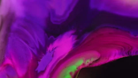 Paint drip ink flow neon fluid mix purple pink dye Stock Footage 256121578