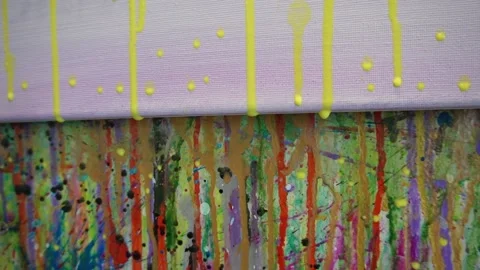 Paint dripping on canvas at art class or art studio Stock Footage 255819133
