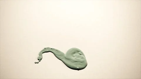 Paint dripping onto canvas Stock Footage 56237160