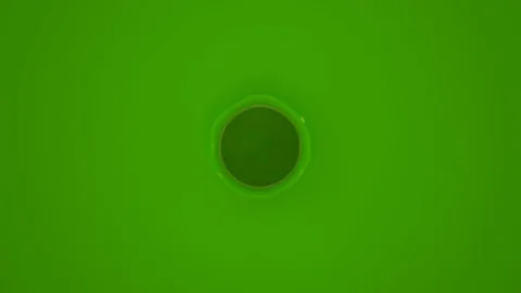Paint drop falling in slow motion in green paint and making beautiful crown Stock Footage 87570801