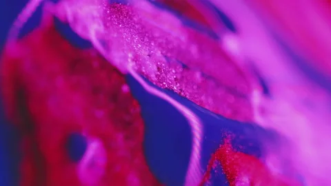 Paint drop glitter fluid spill neon blue pink ink Stock Footage 275310330